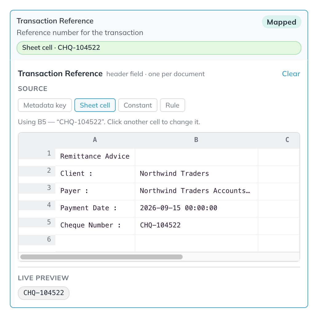 Transaction Reference read from cell B5 of the area above the table, with the grid of that area and a live preview of CHQ-104522